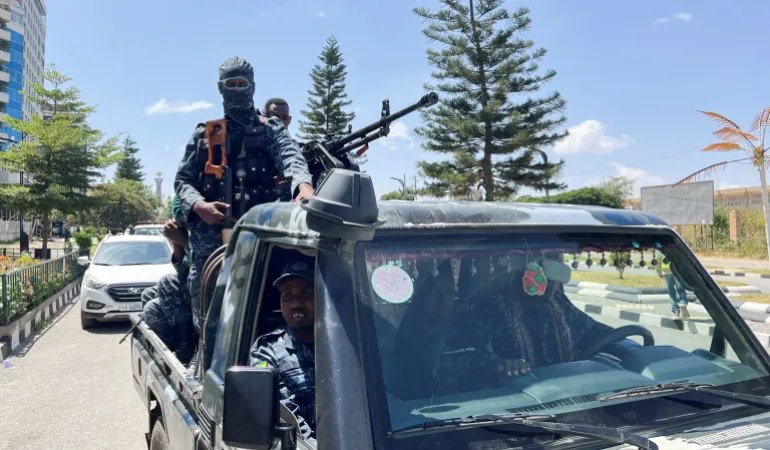 Members of the Ethiopian Federal Police (EFP) patrol after Tigray People’s Liberation Front (TPLF) army retreated from the regional capital near the Tigray Martyrs monument in Mekelle, Tigray Region, Ethiopia, October 8, 2026. Picture taken with a mobile phone. Obtained by REUTERS TPX IMAGES OF THE DAY