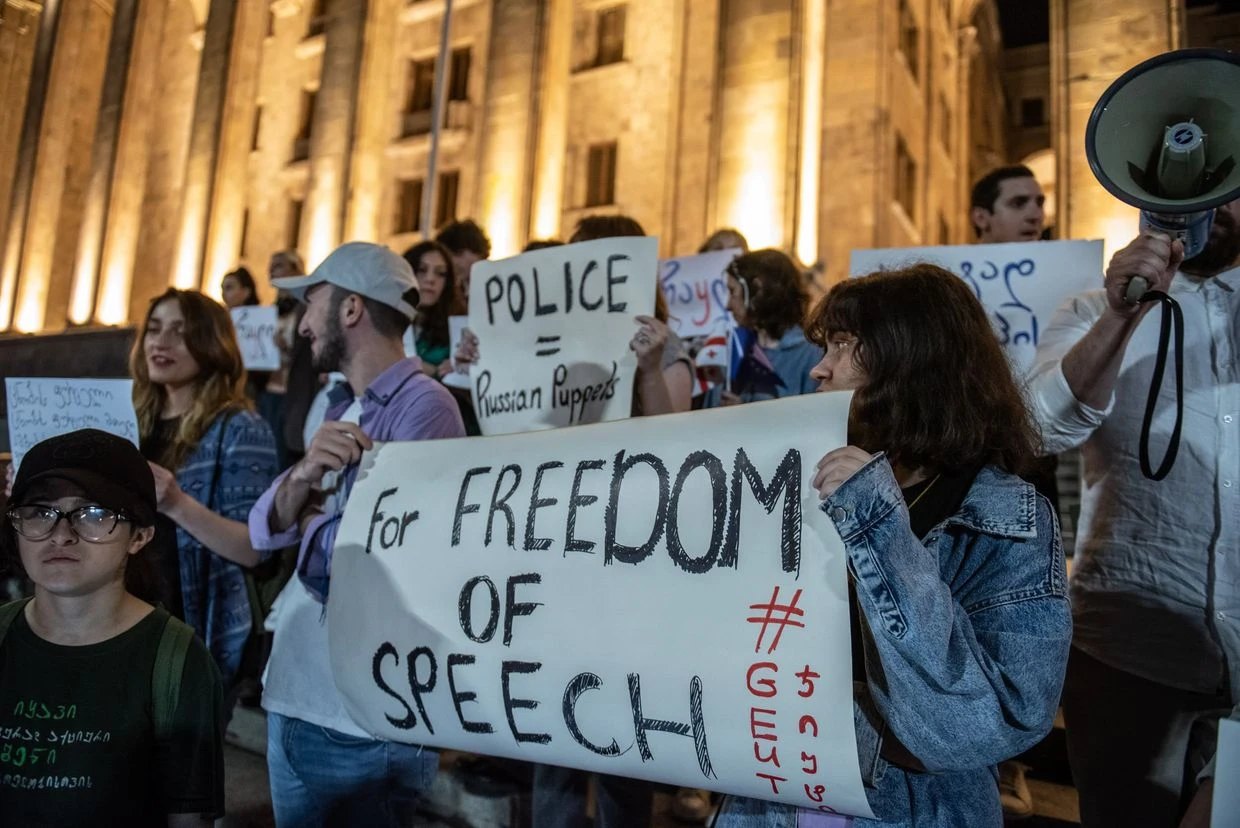 Protesters hold a sign defending freedom of speech in Tbilisi, June 2023. Photo: Mariam Nikuradze/OC Media