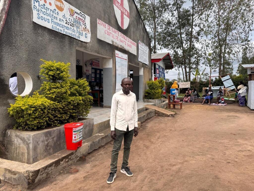 Community health worker Emmanuel Birunga outside a health centre in Rwampara, Ituri province, eastern DRC, October 2026.
