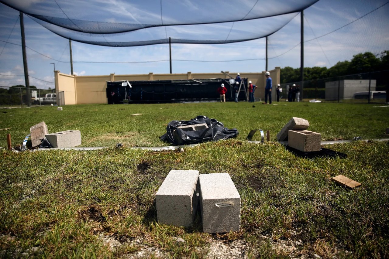 A trailer rolled over in the far part of a wind testing field