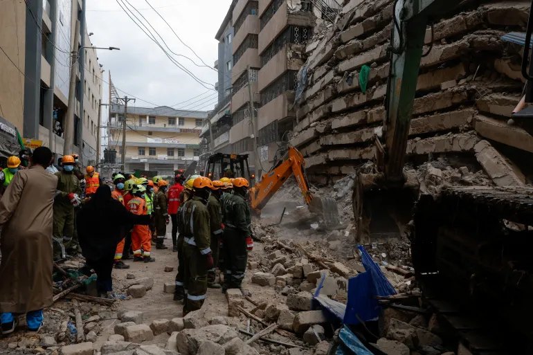 Emergency personnel work at the site of a building collapse in Eastleigh, Nairobi, Kenya, October 23, 2026. REUTERS/Monicah Mwangi